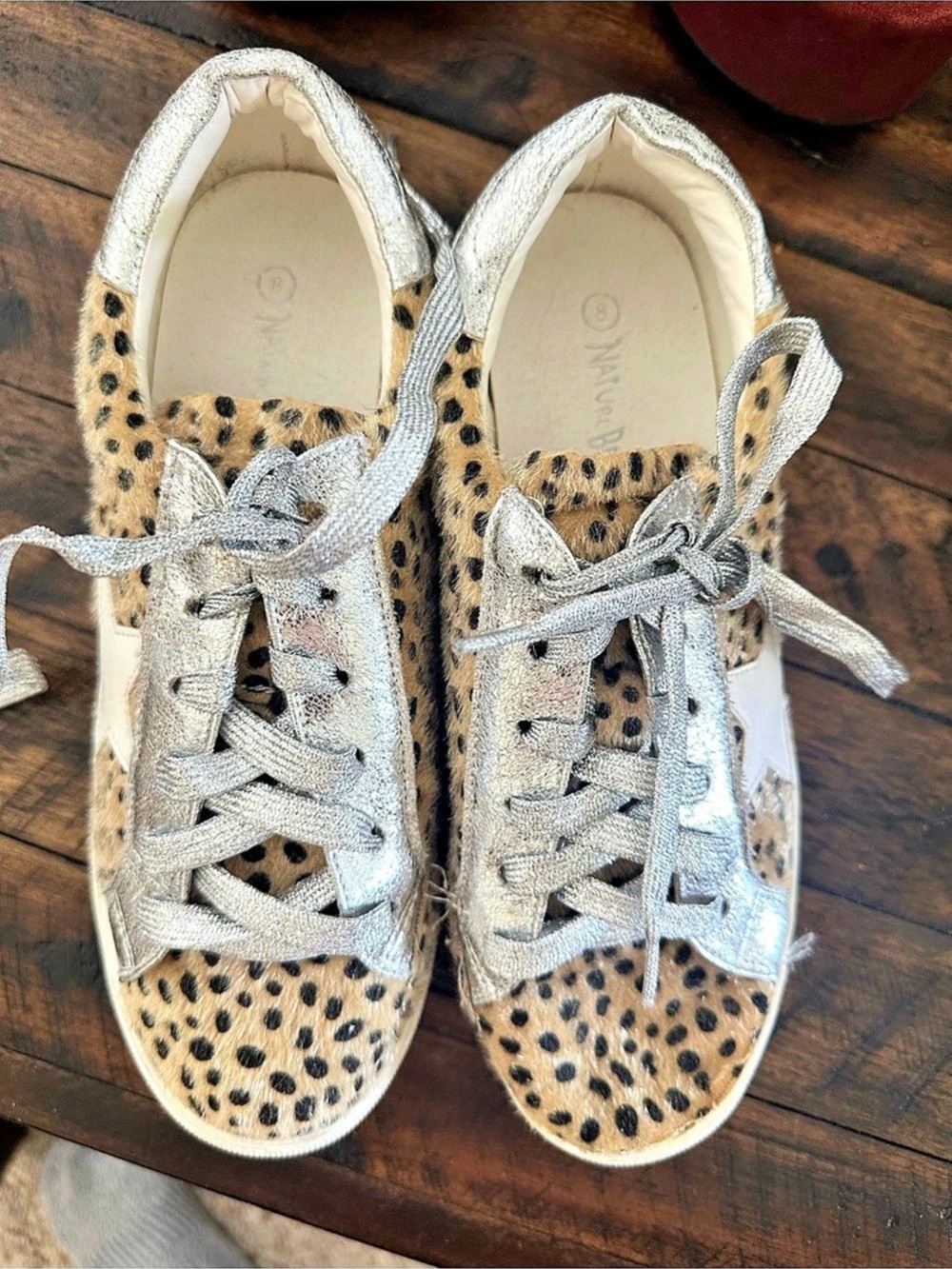 Nature Breeze Fuzzy Cheetah Sneakers featuring an animal print upper with silver